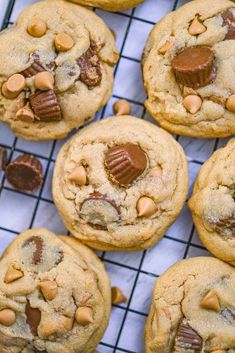 cookies with chocolate chips and peanut butter in them on a cooling rack, ready to be eaten