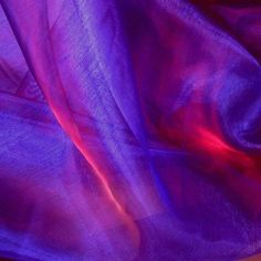 a purple cloth is laying on top of a table