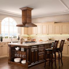 a large kitchen with an island in the middle