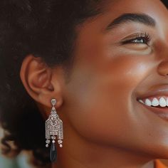 Ross-Simons - C. 1980 Vintage Black Onyx, 1.35ct t. w. Diamond Drop Earrings, 14kt Gold. C. 1980. Reminiscent of fine chandeliers, this pair of drop earrings from our Estate collection are over-the-top elegant. Suspending sleek 21x7mm teardrop-shaped onyx gems are exquisitely elaborate designs covered with glittering 1.35 ct. t. w. round multi-cut diamonds. The designs feature platinum tops and 14kt white gold bottoms. Hanging length is 2 1/4". Post/clutch, diamond and onyx drop earrings. Exclusive, one-of-a-kind Estate Jewelry. Classic Chandelier Earrings With Diamond Accents For Evening, Classic White Gold Chandelier Earrings For Evening, Art Deco Evening Earrings With Diamond Accents, Formal Silver Chandelier Earrings With 17 Jewels, Classic Pierced Chandelier Earrings For Formal Occasions, Classic Drop Chandelier Earrings For Evening, Classic Chandelier Drop Earrings For Evening, Formal Crystal Earrings, Art Deco Dangle Earrings For Formal Occasions