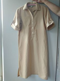 "Vintage 80s camel brown shirt dress. Safari dress with short sleeve buttoned cuffs. Front waist up buttoned cotton dress side cut.Marked as size 38. 100% cotton. From shoulder to shoulder 17\"43cm Bust 42\"107cm Sleeve length 10\"25cm Length 41\"104cm." Collared Beige Cotton Shirt Dress, Brown Cotton Shirt Dress For Summer, Summer Collared Shirt Dress With Cuffed Sleeves, Collared Shirt Dress With Cuffed Sleeves For Summer, Summer Khaki Button-up Shirt Dress, Khaki Button-up Shirt Dress For Summer, Classic Beige Short Sleeve Shirt Dress, Summer Collared Khaki Shirt Dress, Summer Collared Shirt Dress In Khaki