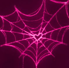 a spider web on a purple background