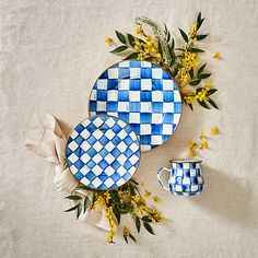 blue and white checkered plates with matching cups