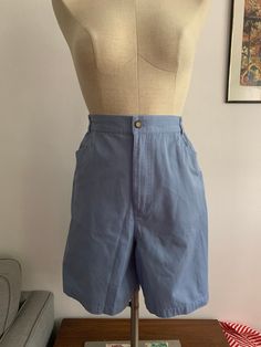 This pair of cute powder blue shorts are perfect to add to your rotation for this summer. They're high waisted and have pockets, have belt loops so you can pair them with a cute belt. Perfect for those casual days with a cute resort oversized shirt. Size 16. No returns. Measurements: Waist: 30 inches  Hips: 42 inches  Rise: 14 inches  Length: 19 inches  FOLLOW US + Instagram @thriftgathershop Vintage High Waisted Shorts, Dad Shorts, High Rise Shorts, Vintage Shorts, Blue Vintage, Powder Blue, Oversized Shirt, Blue Shorts, High Waisted Shorts