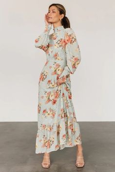 You do not want to miss out on our brand new Luciana Maxi Dress in a cute beige and rose floral color. This dress features flowing chiffon material and a high smocked neckline. Blue Wedding Guest Dresses, Long Sleeve Satin Dress, Dress Code Wedding, Dress Sage, Sage Dress, Baltic Born, Modern Clothing, Tiered Maxi Skirt, Mob Dresses