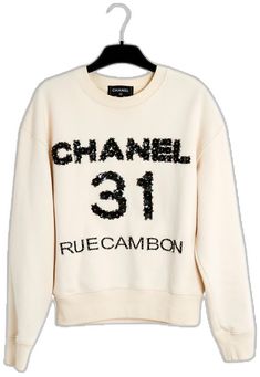 Luxury Crew Neck Sweatshirt For Fall, Luxury Winter Sweatshirt With Letter Print, Luxury Embroidered Logo Sweatshirt For Fall, Luxury Crew Neck Sweatshirt For Streetwear, Luxury Cotton Sweatshirt With Embroidered Logo, Luxury Cotton Sweatshirt For Fall, Luxury Cotton Crew Neck Sweatshirt, Luxury White Cotton Sweatshirt, Casual Crew Neck Sweater With Sequins