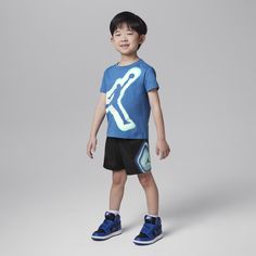 The smaller ballers-to-be can bring the heat in this 2-piece set. The graphic tee is made of jersey knit fabric in a classic cut and the matching shorts are made of breathable mesh with a stretch waistband they can move and play freely in. Sporty Moisture-wicking Short-sleeved Top, Summer Athleisure T-shirt For Playwear, Sporty Short-sleeved Moisture-wicking Tops, Sporty Short Tops With Moisture-wicking, Cotton Tops With Built-in Shorts For Sports, Sportswear Tops For Playwear, Short Sleeve Sportswear Tops For Play, Casual Moisture-wicking Short Top, Cotton Activewear With Built-in Shorts And Short Sleeve