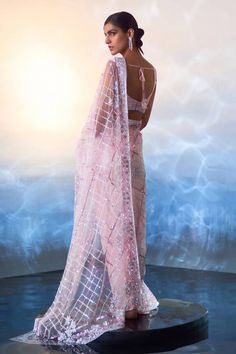 Pink net saree with glass buggle bead, sequin and crystal embroidery. Paired with an embroidered blouse and petticoat. - Aza Fashions Saree Gowns, Dhoti Saree, Cotton Sarees Handloom, Crystal Embroidery, Ruffle Saree, Indian Wedding Wear, Net Saree, Embellished Blouse, Lehenga Saree