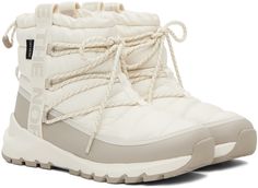 Ankle-high quilted ThermoBall™ Eco-insulated recycled PET ripstop boots in white. Water-repellent non-PFC DWR coating. · Waterproof DryVent™ membrane · Lace-up closure · Logo-woven webbing trim at sides · Bungee-style drawstring at collar · Pull-loop at heel counter · Cushioned OrthoLite® Eco LT™ footbed · Faux-fur lining · EVA foam rubber midsole · Treaded rubber outsole Supplier color: Gardenia white/Silver grey Functional White Waterproof Boots, White Waterproof Winter Boots, White High-top Sporty Waterproof Boots, Sporty White High-top Waterproof Boots, White Round Toe Functional Boots, Functional White Round Toe Boots, White Functional Round Toe Boots, White Waterproof Boots For Winter Outdoor Activities, White Waterproof Outdoor Boots