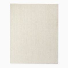 a white square rug on a white background