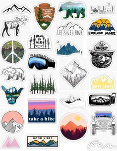 various stickers with mountains and trees on them