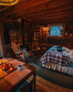 a bedroom with a bed, desk and chair in it's centerpieces