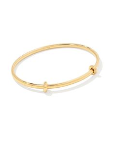 A minimalist and elevated charm base featuring two removable spacers for maximum versatility. Designed to capture your favorite charms, the Charm Bangle Bracelet in 18k Gold Vermeil is an essential for anyone with a growing charm collection or interested in adding some personality to their stack. 

 Please note: Additional charm spacers are sold separately. Charm Collection, Bar Jewelry, Zodiac Jewelry, Bangle Bracelets With Charms, Demi Fine Jewelry, Silver Prices, Initial Jewelry, Engraved Jewelry, Charm Bangle