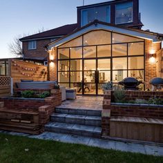 an outdoor patio with steps leading up to it