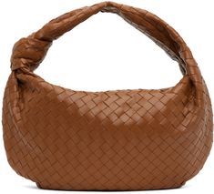 Intrecciato-woven grained lambskin shoulder bag in brown. · Knotted accent at fixed shoulder strap · Zip closure · Zip pocket at interior · Grained calfskin lining · H11.5 x W17 x D2.25 in Supplier color: Wood/Gold Brown Intrecciato Weave Evening Shoulder Bag, Designer Brown Woven Leather Shoulder Bag, Formal Brown Woven Leather Shoulder Bag, Luxury Brown Bags With Intrecciato Weave, Luxury Brown Bag With Intrecciato Weave, Brown Leather Shoulder Bag With Intrecciato Weave, Formal Brown Shoulder Bag With Braided Handles, Small Jodie Bag, Small Jodie