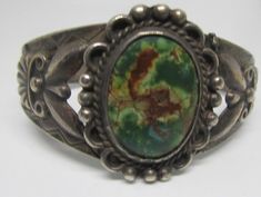 Green Patina Bracelet, Vintage Cabochon Bangle Bracelet, Oval Turquoise Collectible Bracelet, Vintage Cabochon Bangle Bracelets, Vintage Jewelry With Patina, Vintage Round Jewelry With Patina, Vintage Green Bracelet With Patina, Traditional Patina Bracelet, Traditional Patina Bracelet Jewelry