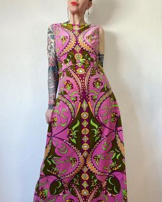 Sweet Psych. Stunning Vintage 1960's pink psychedelic printed cotton velvet maxi dress with princess seam bust, looped button side torso, inverted pleats and attached bow waist belt, made in Italy. Not Pucci, but dang she carries that vibe v-well. And look at that print & palette. She's been a labor of restoration love over the last month or so & I'm proud of how she turned out and happy to finally offer her up to you.  💚 Marked a vintage size 12 Fits M/possibly smaller L (I'm about a M), but please use measurements as fit guide.  15" shoulders  19" bust (on the half)  16" waist (on the half)  20" hip above inverted side pleats (on the half)  Up to 23" hip low hip with inverted pleats (on the half)  55" length  *if hips are larger than 20", this would be a slip over the head piece, where Velvet Maxi Dress, Velvet Maxi, Cotton Velvet, Princess Seam, Psych, Half Up, Dress Clothes For Women, Waist Belt, Headpiece