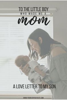 a woman holding a baby in her arms with the words to the little boy who made me mom