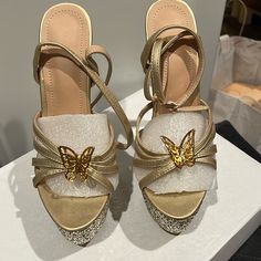 Brand New, Never Worn, Gorgeous Gold, Butterfly Platform Heels. Purchased For Special Occasion, But Never Used. The Platform Is 2 Inches And The Heel Is 6 Inches. These Are Gorgeous!! Gold Synthetic Heels, Butterfly Platform Heels, The Platform, Gold Butterfly, Platform Heels, Platform Sandals, Me Too Shoes, 6 Inches, Special Occasion