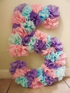 the letter c made out of tissue paper flowers