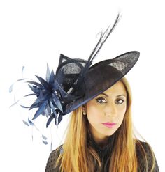 Beautiful Sinamay Feathers Fascinator Hat In Navy Blue Measures about 12 Inches wide It is mounted with a headband. We will always try and match the fascinator colour to the headband. If the colour is unavailable then we will use BLACK. If you dont want black please state your hair colour at checkout and we will use a band that matches your hair. Due to the size this needs to be sent to USA for $65 dollars via UPS and is a guaranteed service within 3 days. If you live in Australia, New Zealand o Royal Blue Fitted Hat For Party, Navy Party Hat For Kentucky Derby, Navy Hat For Kentucky Derby Party, Blue Fitted Hat For Party, Royal Blue Fitted Fascinator For Party, Blue Fitted Fascinator For Wedding, Royal Blue Fitted Fascinator For Wedding, Royal Blue Fitted Fascinator Hat, Blue Short Brim Fascinator For Wedding