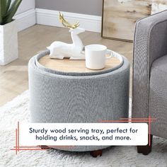 a coffee table with a deer figurine sitting on top of it next to a chair