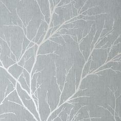 a tree with white branches against a gray background