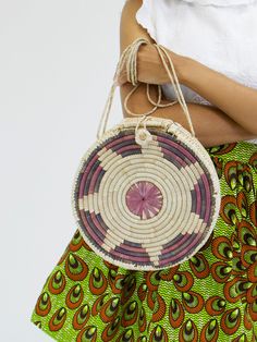 The Masai Naomi Bag adds a warm-weather must-have. 20” strap drop Made in Burkina Faso * Hand made. No two are identical RTW item shipping 3-5 days. Bohemian Shoulder Bag With Long Strap For Travel, Pink Shoulder Bag With Leather Handles For Vacation, Bohemian Bag With Long Strap For Daily Use, Bohemian Bag With Long Strap, Bohemian Bags With Long Strap For Daily Use, Summer Shoulder Bag With Adjustable Strap And Long Handle, Handwoven Crossbody Bags For Vacation, Bohemian Beach Bag With Detachable Strap, Summer Handwoven Crossbody Shoulder Bag