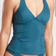 Athleta Two Piece Sculpted Halter Tankini & Sculpted Bikini Bottoms. Brand New With Tags And Hygienic Liner In Tact. Color Is Ocean Wave Teal. Medium Bottoms With Size 34 B/C Top. Sporty Tankini With Built-in Padding For Swimming, Stretch Swimwear With Built-in Cups For Workout, Beach Tankini With Built-in Padding, Fitted Workout Tankini With Built-in Bra, Athleisure Swimwear With Built-in Bra For Poolside, Sporty Beach Tank Top With Built-in Bra, Fitted Activewear With Built-in Padding For Beach, Sports Tankini With Built-in Padding And Stretch, Sleeveless Tankini With Built-in Cups For Poolside