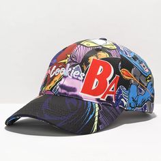 New With Tags. "The Collage Strapback Hat From The Cookies X Batman Collaboration Features An Array Of Sublimated Images From The Batman Comics And Comes In An Unstructured, 6-Panel Construction With An Adjustable Sizing Piece For The Perfect Fit Every Time." Official Cookies X Batman Collaboration. Sublimated Comic Imagery Throughout. Unstructured, 6-Panel Strapback Hat. Embroidered Cookies Logo At Front Crown. Curved Bill. Embroidered Eyelets For Ventilation. Br Multicolor Snapback Baseball Cap For Streetwear, Multicolor One Size Fits Most Baseball Cap For Streetwear, Fun Dad Hat For Streetwear, Fun Streetwear Dad Cap, Fun Snapback Hat With Curved Bill For Streetwear, Fun Curved Bill Snapback Hat For Streetwear, Fun Curved Brim Baseball Cap For Streetwear, Retro Baseball Cap With Graphic Print And Curved Brim, Adjustable Graphic Print Baseball Cap For Sports