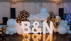 an image of balloons and letters on the dance floor