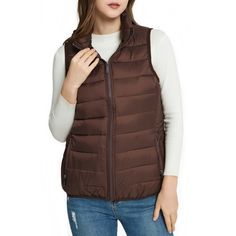 Jodie Womens Puffer Vest By Alpine Swiss Product Features: 100% Nylon Shell, 100% Polyester Fill & Lining STYLISH – The Jodie womens puffer vest is stylish and versatile. Wear it over T-shirts, long sleeve shirts, button downs, or sweaters for endless combinations of warm and fashionable ensembles. WARM – A down alternative filling makes this vest ultra-lightweight and comfortably warm while allowing your arms to have full range of motion. WATER RESISTANT – The nylon shell construction is durabl Bubble Vest, Womens Puffer Vest, High Neck Designs, Brand Store, Puffer Vest, Casual Tee, Cozy Sweaters, Front Zipper, Vest Jacket