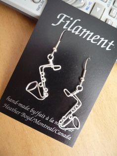 Saxophone Earrings by HeatherBoydWire on Etsy, $14.00 Music-themed Metal Jewelry For Gifts, Artsy Wire Wrapped Earrings Gift, Gift Metal Hoop Earrings Wire Wrapped, Wire Wrapped Metal Hoop Earrings As Gift, Silver Nickel-free Music-themed Earrings, Nickel-free Metal Music-themed Jewelry, Nickel-free Music-themed Metal Jewelry, Music-themed Silver Earrings, Silver Music-themed Metal Jewelry