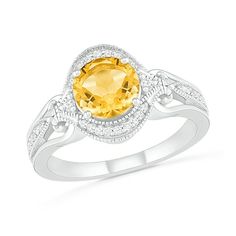 Beautifully wear this vintage-inspired gemstone and diamond ring with your evening attire. Created in sterling silver, this look features a 7.0mm golden yellow citrine embraced by a milgrain detailed frame of shimmering diamonds. Additional diamonds and intricate milgrain detailing line the split shank. Radiant with 1/10 ct. t.w. of diamonds and a brilliant buffed luster, this ring is anything but ordinary. Custom-made to fit her ring size. Sterling silver rings cannot be resized after purchase. Yellow Citrine Ring, Her Ring, Vintage Style Rings, Peoples Jewellers, Sterling Silver Engagement Rings, Citrine Ring, Yellow Citrine, Citrine Stone, Rings For Girls