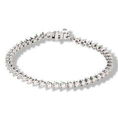 This 5.0 ct. Three Prong Classic Diamond Tennis Bracelet will bring an exquisite touch of luxury to any look. Featuring timeless styling, this bracelet's perfect balance of classic and modern style allows it to be worn with elegance on any special occasion. Its three prong setting facets cut makes it sparkle from day to night. Diamond Tennis Bracelet, Tennis Bracelet Diamond, Natural Earth, Tennis Bracelet, 18k Rose Gold, Diamond Shapes, Prong Setting, Lab Grown Diamonds, Natural Diamonds