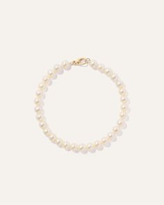 Classic luxury defined. Our 14K Gold Freshwater Cultured Pearl Bracelet has luminous freshwater pearls strung together in an organic design that never goes out of style. Finished with a lobster clasp for easy wear, this bracelet is the perfect arm candy for adding a touch of low-key glamour.  | Quince | Women's 14k Gold Freshwater Cultured Pearl Bracelet in Yellow Gold Braclets Gold, Christmas Presents For Friends, Money Clothes, Cultured Pearl Bracelet, Freshwater Pearl Bracelet, Jewelry Essentials, Organic Design, Akoya Pearls, Freshwater Cultured Pearls