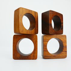 three wooden blocks stacked on top of each other