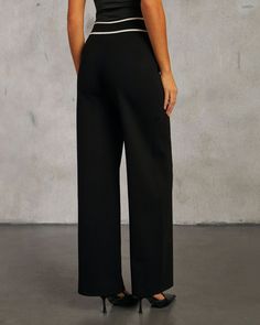 Step into sophistication with the Keeting Contrast High Waisted Pants—a wardrobe essential for the discerning fashionista. Crafted from heavyweight knit fabric, these pants feature a chic contrast waist that adds a touch of upscale elegance. Perfect for achieving a polished look with effortless ease, these pants embody a rich girl aesthetic with their traditional, yet modern, appeal. Pair with the matching cardigan, sold separately, to complete the look. Runs large, consider sizing down Heavywei Chic Wide-leg Pants For Work, Elegant Business Casual Bottoms With Elastic Waistband, Elegant Business Casual Dress Pants With Elastic Waistband, Elegant Elastic Waistband Bottoms For Business Casual, Elegant Non-stretch Dress Pants With Belt Loops, Chic Formal Dress Pants With Elastic Waistband, Ankle-length Evening Pants With Belt Loops, Evening Ankle-length Pants With Belt Loops, Chic Evening Dress Pants With Belt Loops