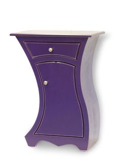 a purple and white side table with two drawers on one end, and an open drawer on the other