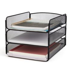 three tiered black mesh desk organizer with books and binders on each shelf in front of white background