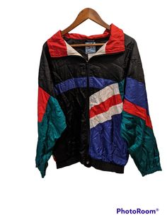 This listing is for one unique vintage windbreaker by the brand Santana. This cool 90s piece is made of nylon and has a color block pattern. Great condition with minor wear from use. it is size XL. Photos are part of the description. The items pictured are the only pieces included in the lot. All items come from a pet- and smoke-free home. Note that color differences may exist due to differences in monitor settings. All sales are as-is and are final. I no longer accept returns or exchanges for a Sporty Patchwork Nylon Windbreaker, Sporty Nylon Windbreaker With Patchwork, Sporty Nylon Patchwork Windbreaker, Retro Multicolor Color Block Track Jacket, Retro Sports Windbreaker With Color Block, Retro Color Block Windbreaker For Sports, Vintage Black Nylon Windbreaker, Multicolor Patchwork Track Jacket For Streetwear, Casual Multicolor Patchwork Windbreaker