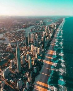 an aerial view of the beach and ocean in surfers paradise, gold coast australia