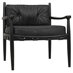 a black leather chair with arms and legs