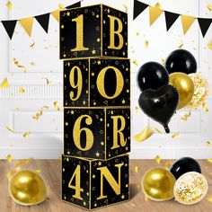 a black and gold birthday card with balloons