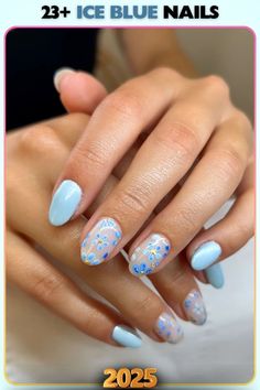 Ice blue nails with delicate floral accents, blending charm and elegance. This artistic design is perfect for romantic events or adding a playful vibe.