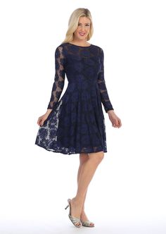 Turn heads in this floral lace cocktail dress with sheer long sleeves by Celavie 6327. This beautiful knee length dress features a scoop neck bodice embroidered with rose floral appliques, sheer lace sleeves, short A-line skirt that falls at the knees, and a zipper closure. Affordably priced at $99, this short party dress is perfect for any formal event and will keep you on budget! Designer: Celavie Style Number: 6327 Material: Lace, 100% Polyester Details: Bra Cup, Fully Lined Fit: The model is Short Dress With Long Sleeves, Lace Short Dress, Strapless Lace Wedding Dress, Wedding Guest Dresses Long, Elegant Wedding Guest Dress, Cape Wedding Dress, Floral Lace Shorts, Military Ball Dresses, Cocktail Formal