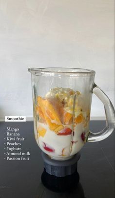 a blender filled with fruit and yogurt