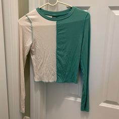 This Is A New With Tags Wild Fable Cropped Shirt In Size Small. It Is A Teal Green And Cream Color, Super Soft 95% Rayon/ 5% Spandex Material. Trendy Long Sleeve Color Block Tops, Summer Color Block Tops For Layering, Green Cotton Blouse For Layering, Green Color Block Long Sleeve Top, Spring Green Color Block Shirt, White Color Block Tops For Spring, Green Color Block Tops For Layering, Summer Long Sleeve Color Block Tops, Summer Color Block Long Sleeve Tops