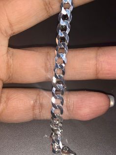 This men’s 6mm-wide diamond-cut solid Cuban link chain necklace crafted in sterling silver measures 22.0 inches in length and secures with a lobster claw clasp. Not plated not cheap not hollow Not refundable Last set Unbeatable Huge sale Comes with certificate of authenticity card Beautiful gift wrapping included Led box included Best gift Hurry don’t miss out! Ready to ship today Bracelet and chain included! Silver Cuban Link Bracelet With Oval Links, Solid Cuban Link Bracelet As Gift, Silver Cuban Link Bracelet With Diamond Cut As Gift, Silver Cuban Link Bracelet With Diamond Cut, Gift Silver Cuban Link Chain Jewelry, White Gold Cuban Link Chain Bracelet As Gift, Silver Cuban Link Jewelry With Diamond Cut, Gift White Gold Cuban Link Bracelet, Silver Cuban Link Chain Jewelry For Gift