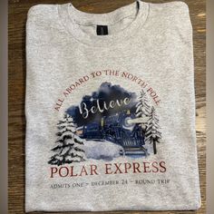 a t - shirt with the words believe polar express on it